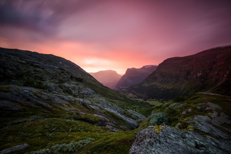 A beautiful sunset in norwegian mountains with pink sky and beutiful color.